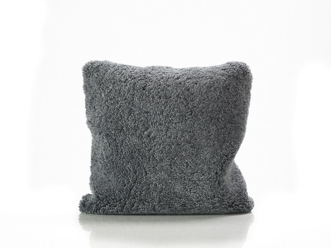 Grey top furry cushions